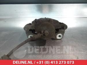 Daewoo Tacuma Front brake calliper, left O325130 photo 2