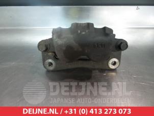 Kia Carnival Bremszange links vorne O325025 foto 2