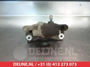 Mitsubishi Lancer Remklauw (Tang) links-achter O376394 foto 2