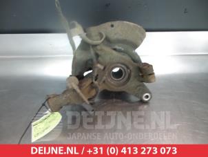 Mazda 323 Knuckle, front right O323297 photo 2