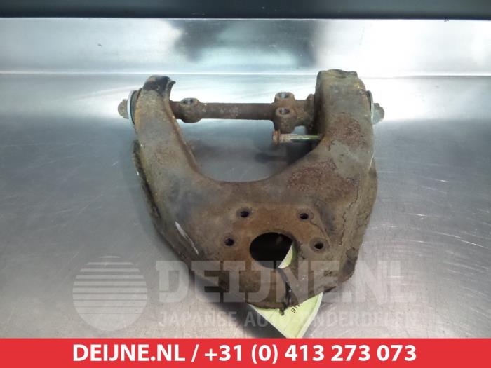 Toyota Hilux Draagarm Boven links-voor O380697