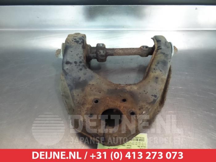 Toyota Hilux Front upper wishbone, right O380913