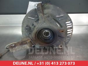 Subaru Impreza Fusee links-voor O322588 foto 2