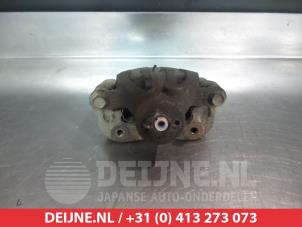 Kia Carens Rear brake calliper, right O377054 photo 2
