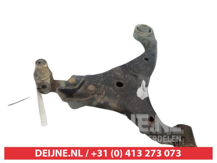 Kia Carens Draagarm onder links-voor O381376