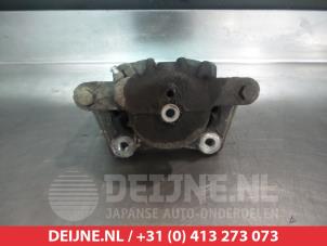 Nissan Micra Bremszange links vorne O324944 foto 2