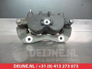 Kia Sorento Front brake calliper, left O325039 photo 2