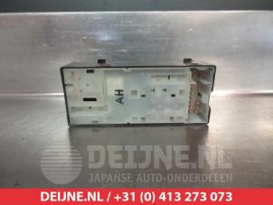 Nissan Micra Multi-functional window switch O311720 photo 2