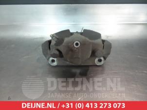 Honda Accord Bremszange links vorne O325334 foto 2