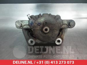 Nissan Micra Bremszange links vorne O324947 foto 2
