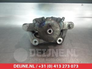 Nissan Micra Front brake calliper, right O326212 photo 2