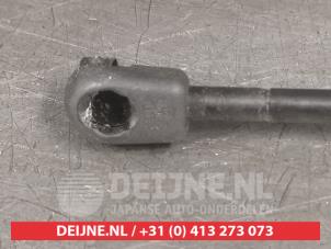 Kia Sportage Gasdemper links-achter O293961 foto 2