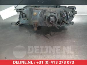 Nissan Almera Koplamp rechts O267056 foto 2