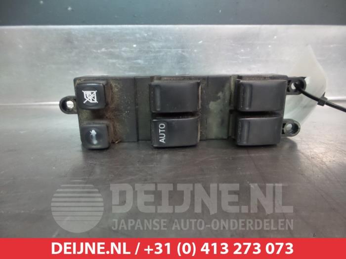 Nissan Primera Combischakelaar ramen O311646