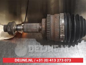 Suzuki Swift Aandrijfas links-voor O389315 foto 2