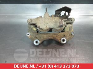 Mitsubishi L200 Remklauw (Tang) links-voor O325235 foto 2