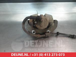 Mazda 5 Front brake calliper, left O324641 photo 2