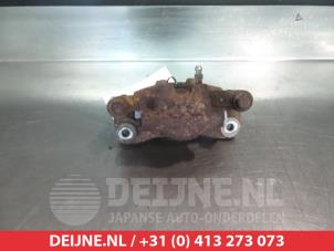 Mitsubishi Lancer Rear brake calliper, left O376398 photo 2