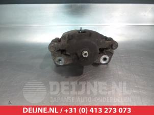 Daewoo Tacuma Remklauw (Tang) links-voor O325131 foto 2