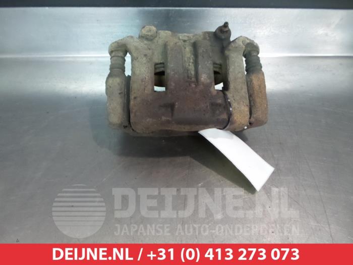 Nissan King Cab Bremszange rechts vorne O326194