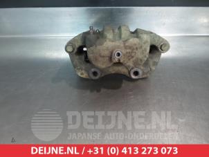 Nissan King Cab Front brake calliper, right O326194 photo 2