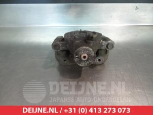 Kia Carens Rear brake calliper, left O376299 photo 2