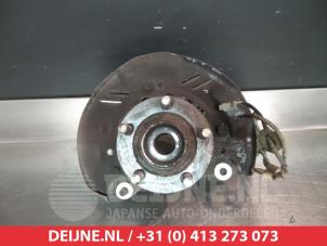 Subaru Impreza Achsschenkel links vorne O322591 foto 2