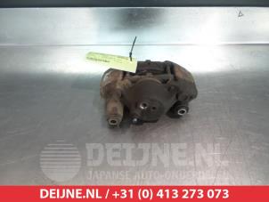 Kia Rio Bremszange links vorne O325001 foto 2