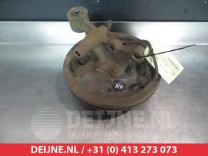 Subaru Legacy Fusee rechts-achter O382975 foto 2