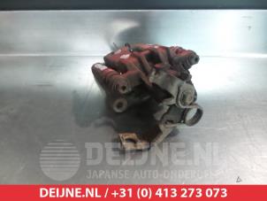 Honda Civic Bremszange links hinten O376513 foto 2