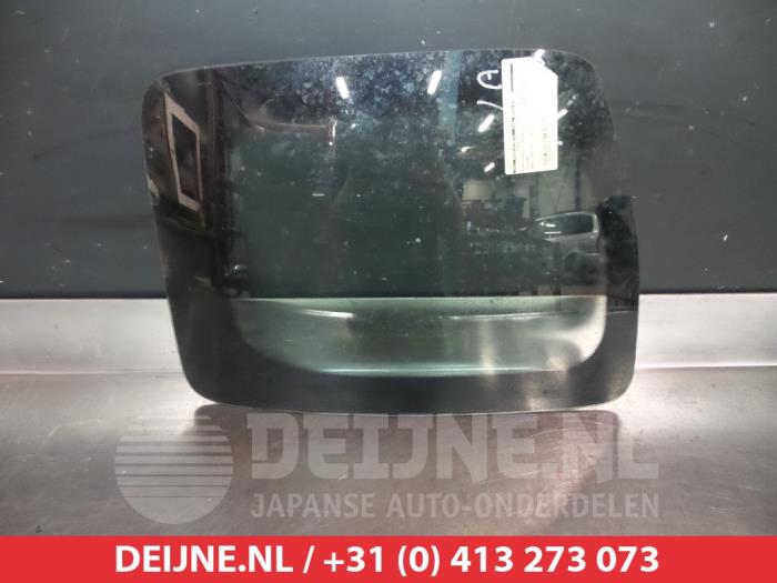 Nissan Navara Driehoeks Ruit links-achter O289700