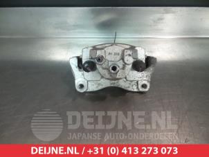 Toyota Yaris Bremszange links vorne O325751 foto 2