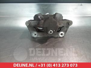 Toyota Avensis Front brake calliper, left O325696 photo 2