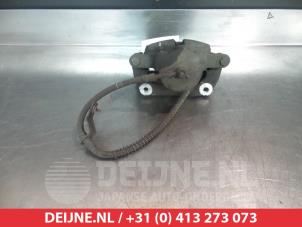 Kia Venga Bremszange links vorne O325033 foto 2