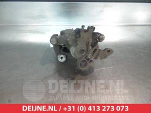 Kia Venga Bremszange links hinten O376270 foto 2