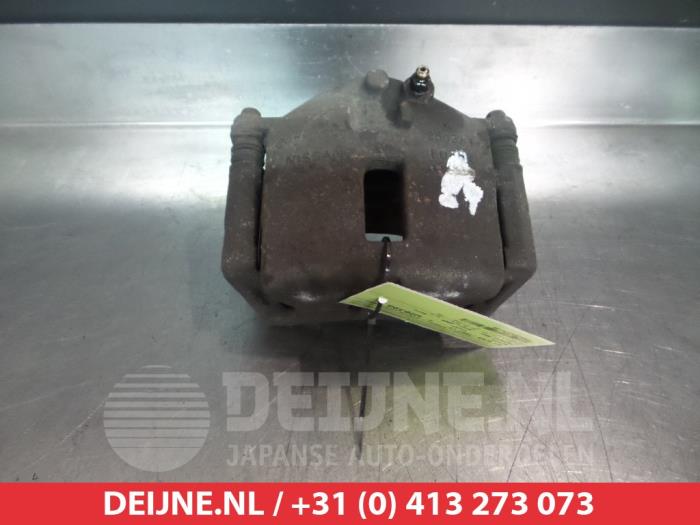Nissan Primera Remklauw (Tang) links-voor O324854