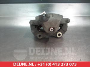 Nissan Primera Bremszange links vorne O324854 foto 2