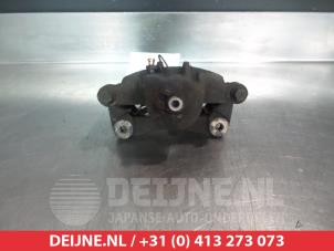 Nissan Micra Bremszange links vorne O324806 foto 2