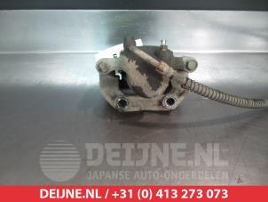 Ssang Yong Actyon Bremszange links hinten O376367 foto 2