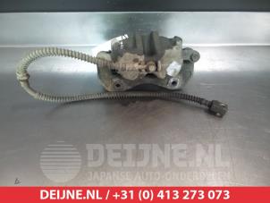Ssang Yong Actyon Bremszange links vorne O325145 foto 2