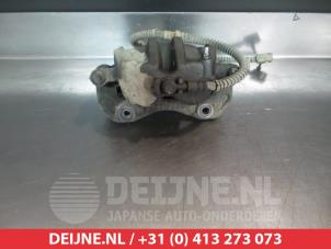 Ssang Yong Actyon Bremszange rechts vorne O326409 foto 2