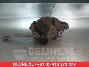 Toyota Previa Rear brake calliper, right O377302 photo 2