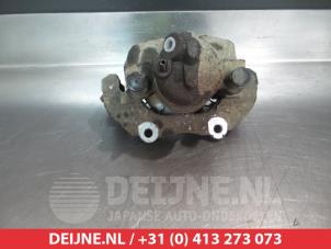 Mazda 3 Bremszange links vorne O324630 foto 2