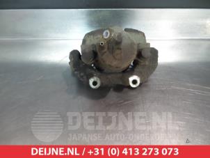 Mazda 3 Bremszange links vorne O324629 foto 2