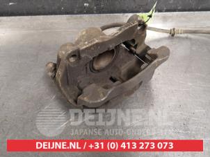 Nissan X-Trail Front brake calliper, right O326162 photo 2