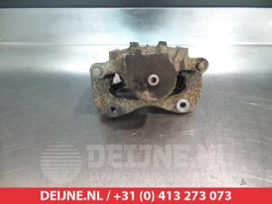 Hyundai Coupe Bremszange links vorne O324735 foto 2