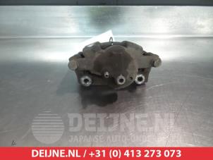 Toyota Aygo Bremszange links vorne O325764 foto 2