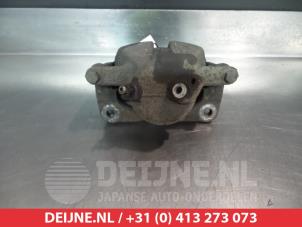 Suzuki SX-4 Bremszange links vorne O325443 foto 2