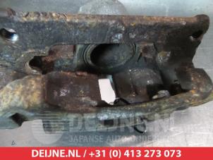 Suzuki Wagon R+ Front brake calliper, left O325498 photo 2