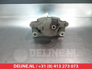 Suzuki Swift Front brake calliper, left O325510 photo 2